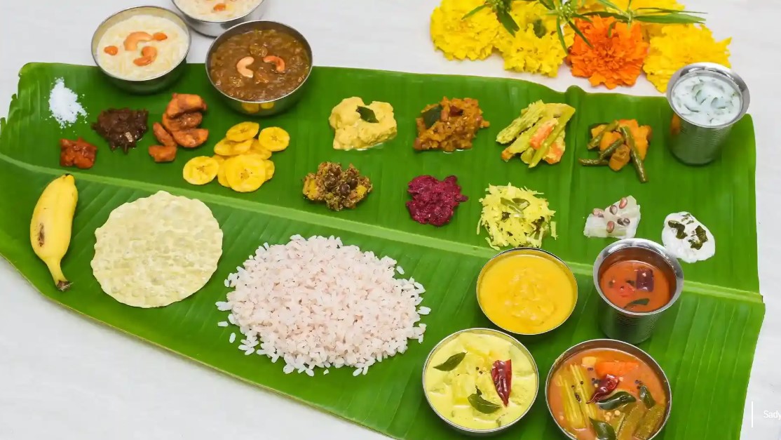 Traditional Kerala sadya feast served on a banana leaf